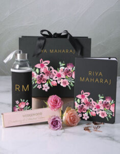 A floral design-inspired diary and water bottle.