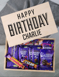 Different chocolates in a personalised wooden crate